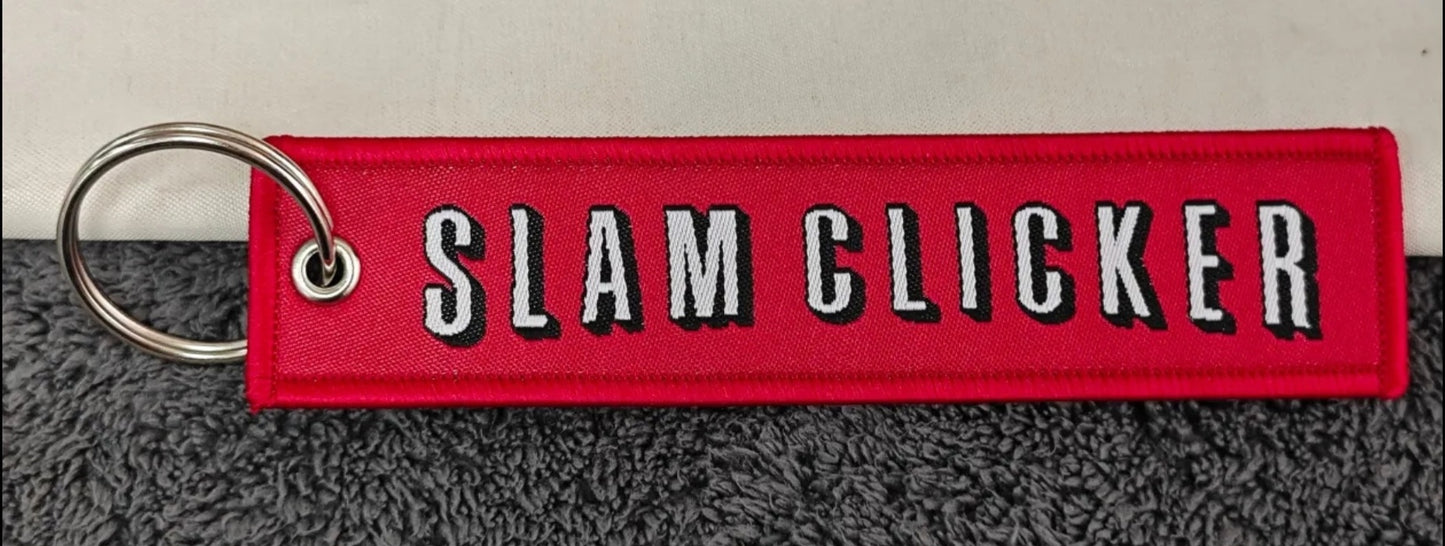 "SLAM CLICKER" bag tag